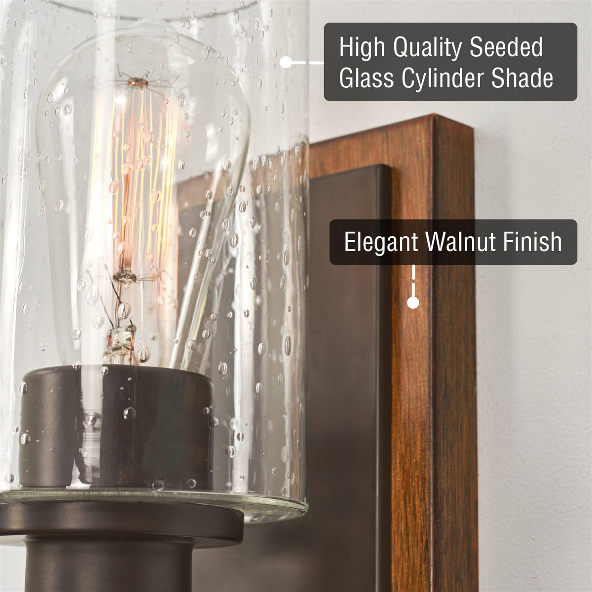 Kira Home Sedona 9" Rustic Farmhouse Wall Sconce with Clear Seeded Glass Shade, Hand-Painted Wood Grain Metal, Walnut Wood and Oil Rubbed Bronze